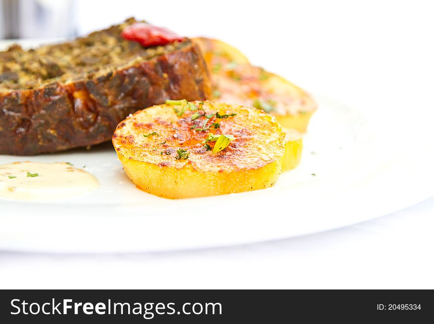 Detail of a traditional Romanian meal, minced veal with potatoes