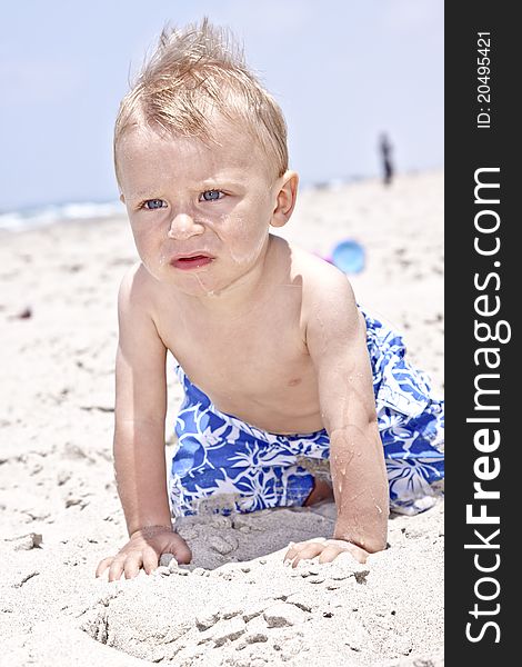 Cute baby on a beach and playing at sunny day. Cute baby on a beach and playing at sunny day