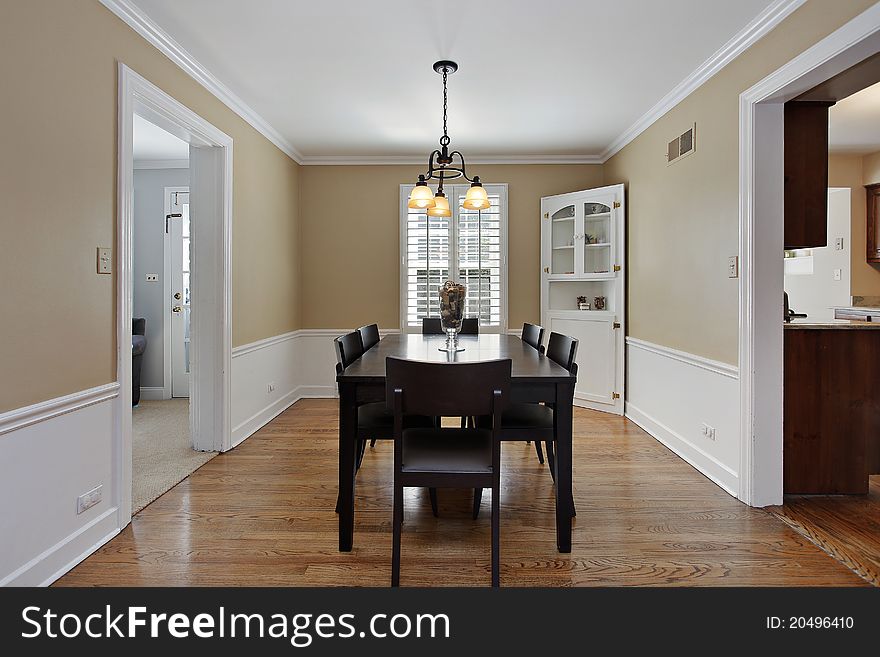Dining room in suburban home with tan walls