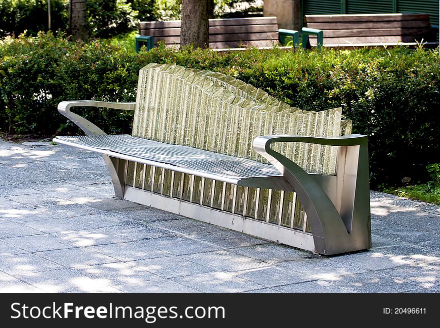 Public bench in a park. Public bench in a park