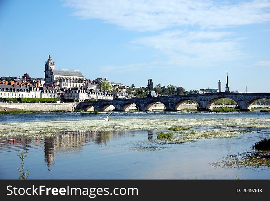 Beautiful quay of Blois on Loire river in France. View on Blois church and Blois castle. Beautiful quay of Blois on Loire river in France. View on Blois church and Blois castle