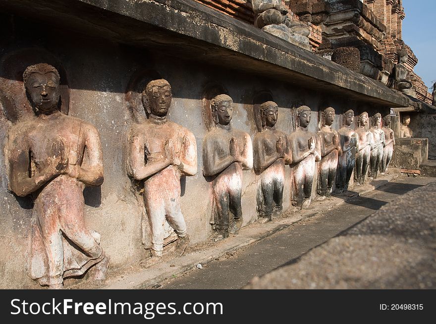 Ancient image buddha statue at Sukhothai historical park Thailand