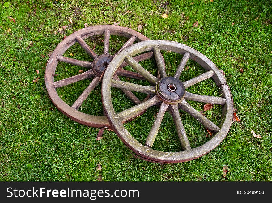 Two old broken wheel from vintage cart. Two old broken wheel from vintage cart