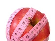 Apple With Pink Tape Measure Over White Background (concept Of H Stock Image Apple With Pink Tape Measure Over White Background (concept Of H Stock Image