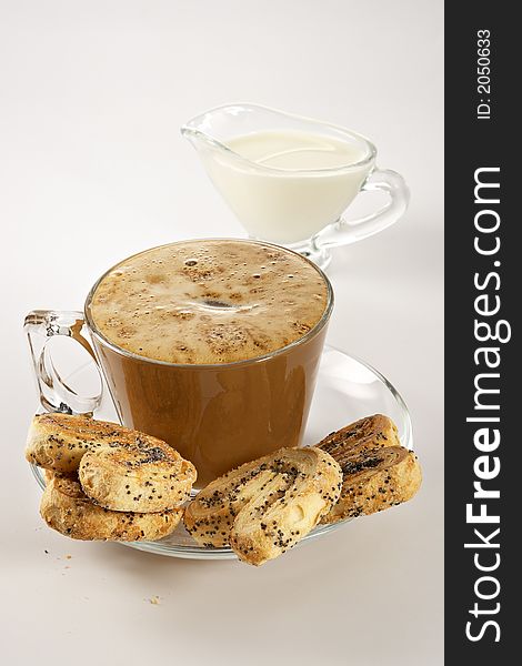 Coffee with cream and cookies-light appetizing breakfast