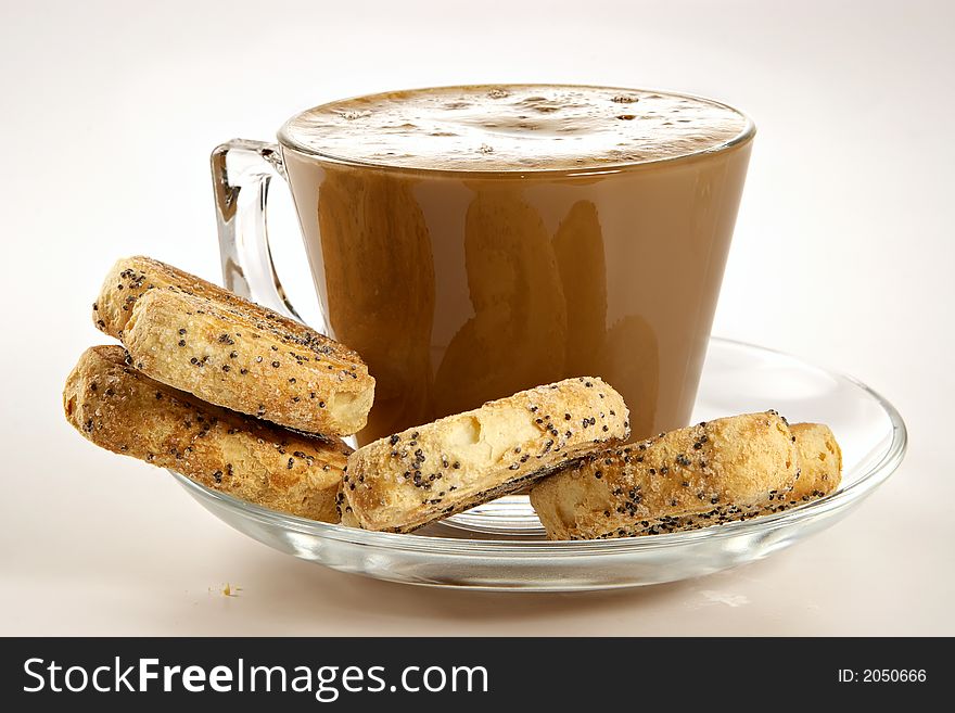 Coffee with cream and cookies-light appetizing breakfast