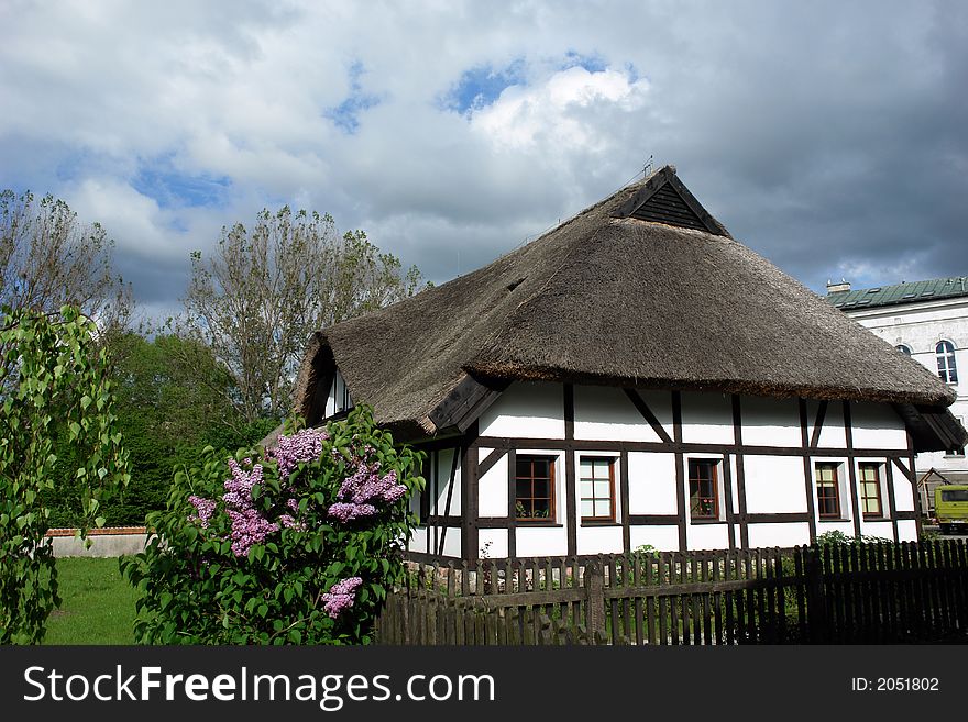 Traditional Polish checked houses, straw roofs. Traditional Polish checked houses, straw roofs.