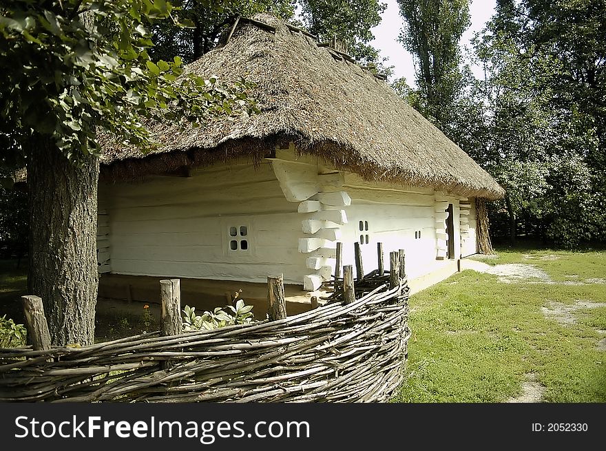 An old European-style house with a straw roof, at Village Museum. An old European-style house with a straw roof, at Village Museum.