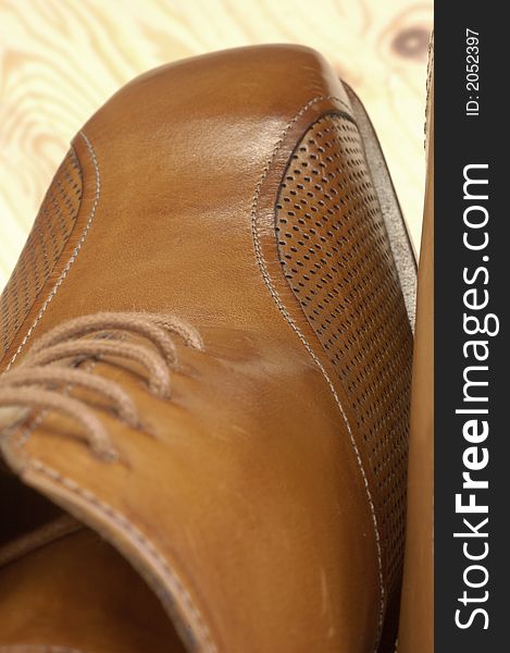 brown luxury shoes and wood. brown luxury shoes and wood