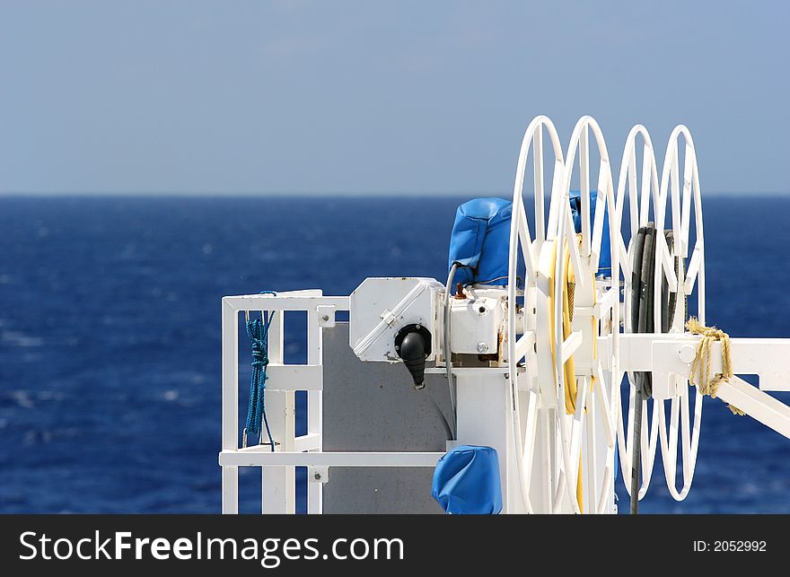 White reels for a moving ramp on a ship