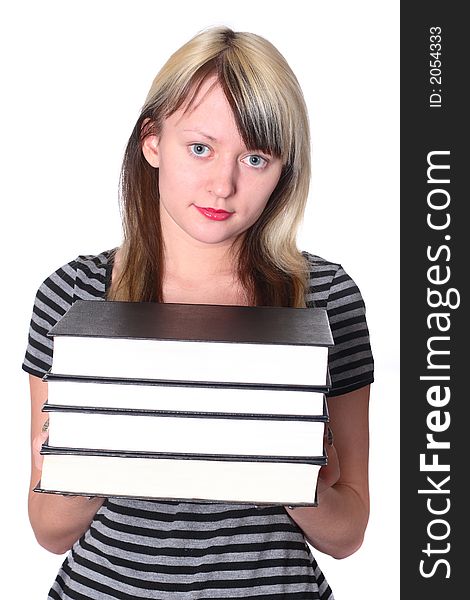 Girl holding stack of books in hands. Girl holding stack of books in hands