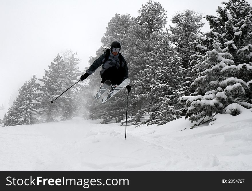 Skier airborne in the backcountry