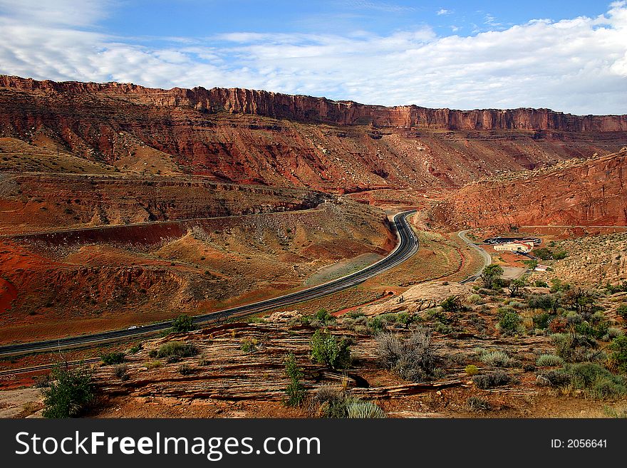 Road through canyons in Utah, near Arches National Park. Road through canyons in Utah, near Arches National Park.