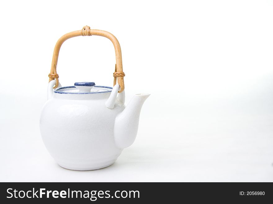 White blue teapot isolated on white