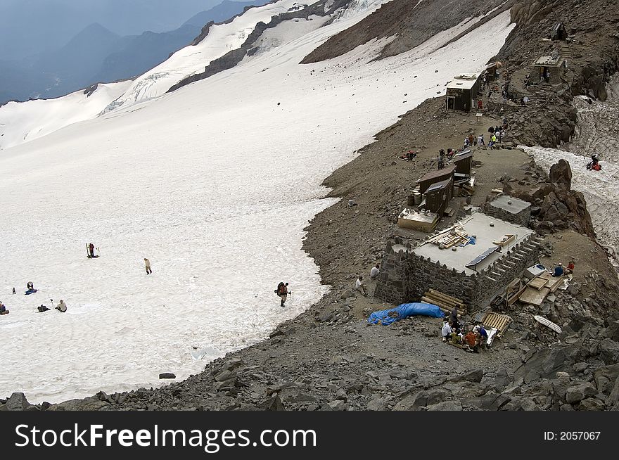 Camp Muir on Mt Rainier with climbers and hikers reaching the resting spot. Camp Muir on Mt Rainier with climbers and hikers reaching the resting spot.