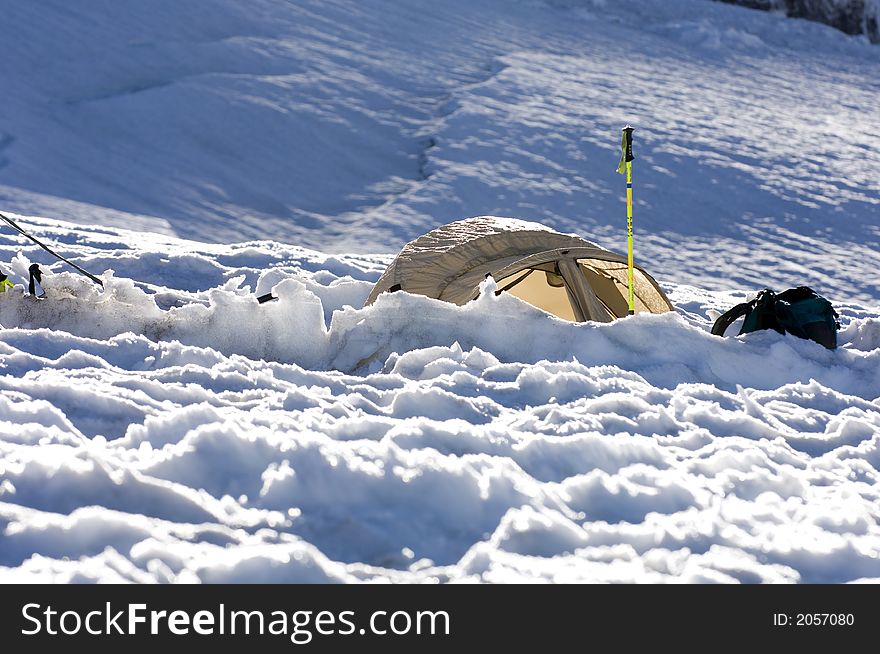 Yellow tent above the snow on Mt Rainier