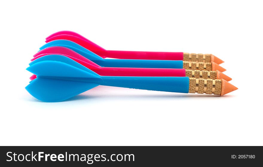 Isolated photo of row of red and blue toy darts.