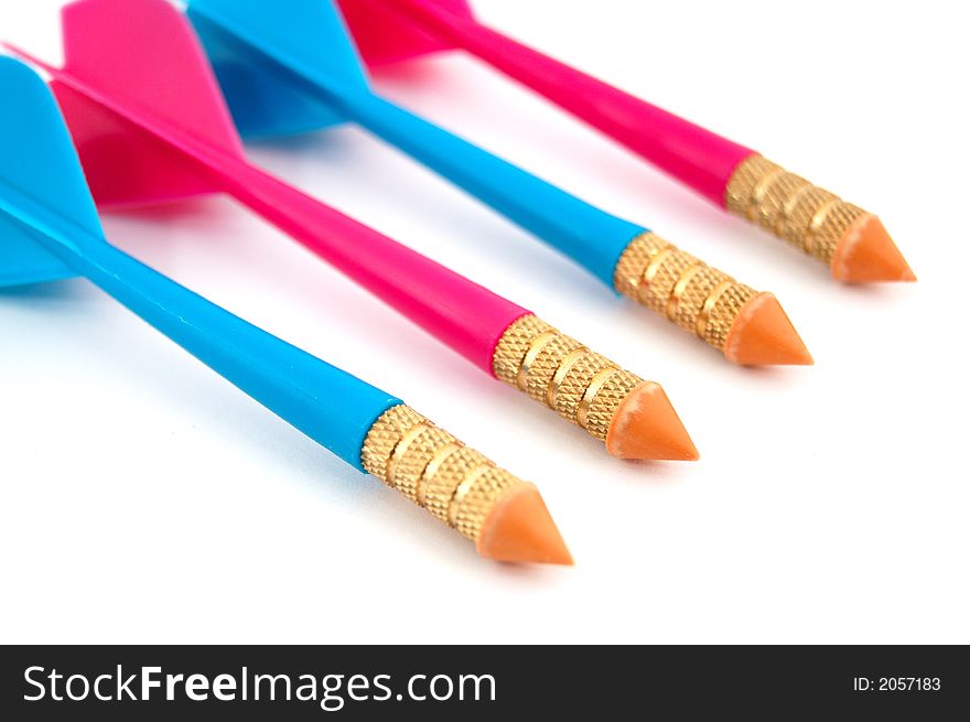 Isolated photo of row of red and blue toy darts.