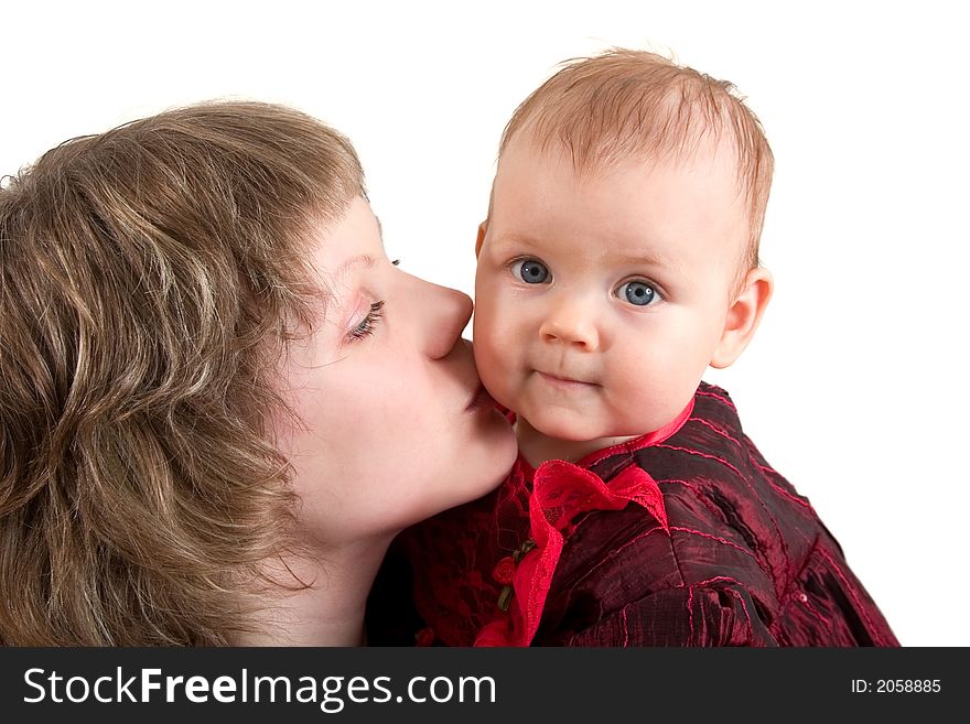 Portrait of mother kissing her little girl, isolated on white background. Portrait of mother kissing her little girl, isolated on white background