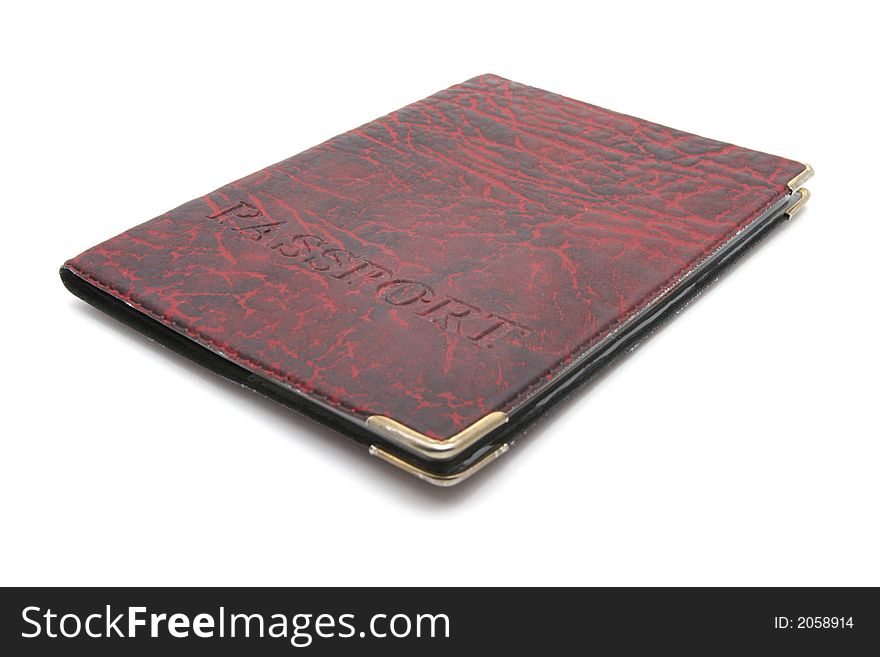 Passport in red cover on white