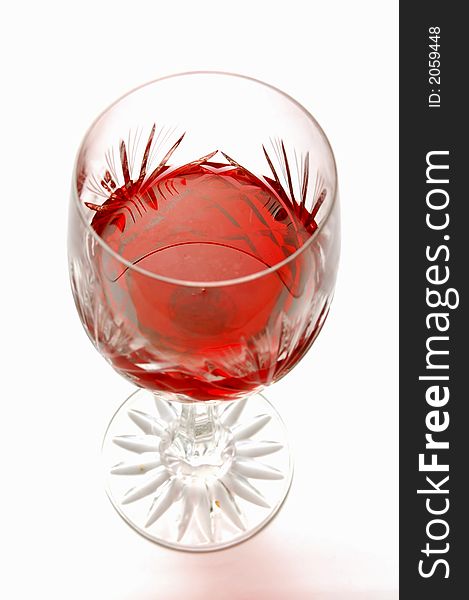 Wineglass with red wine - isolated on white background. Wineglass with red wine - isolated on white background