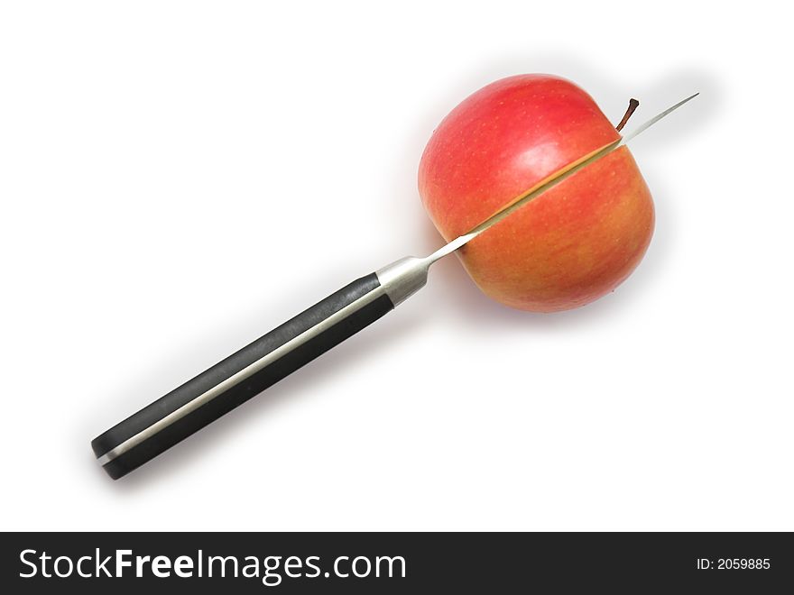 Sliced apple and the knife isolated. Sliced apple and the knife isolated
