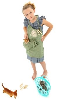 Girl Child In Apron With Kittens In Laundry Basket Royalty Free Stock Images Girl Child In Apron With Kittens In Laundry Basket Royalty Free Stock Images