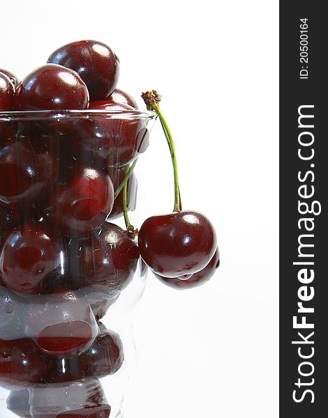 This photograph shows the cherries in a glass goblet. This photograph shows the cherries in a glass goblet.