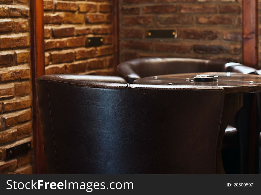 Elegant cafe interior with chair in focus