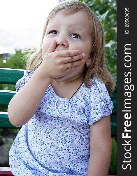 Portrait of blonde little girl outdoors in summer. Portrait of blonde little girl outdoors in summer