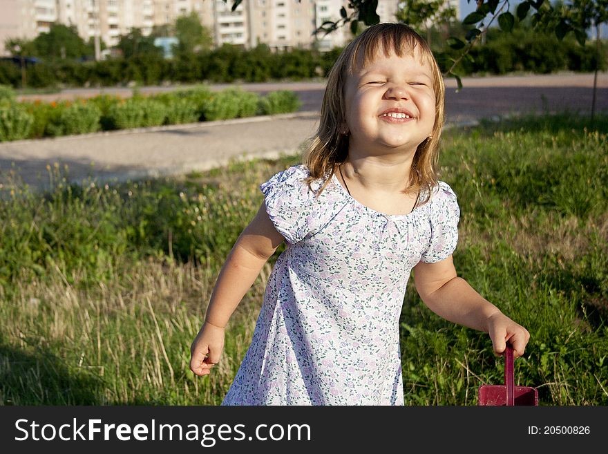 Portrait Of Little Girl Outdoors