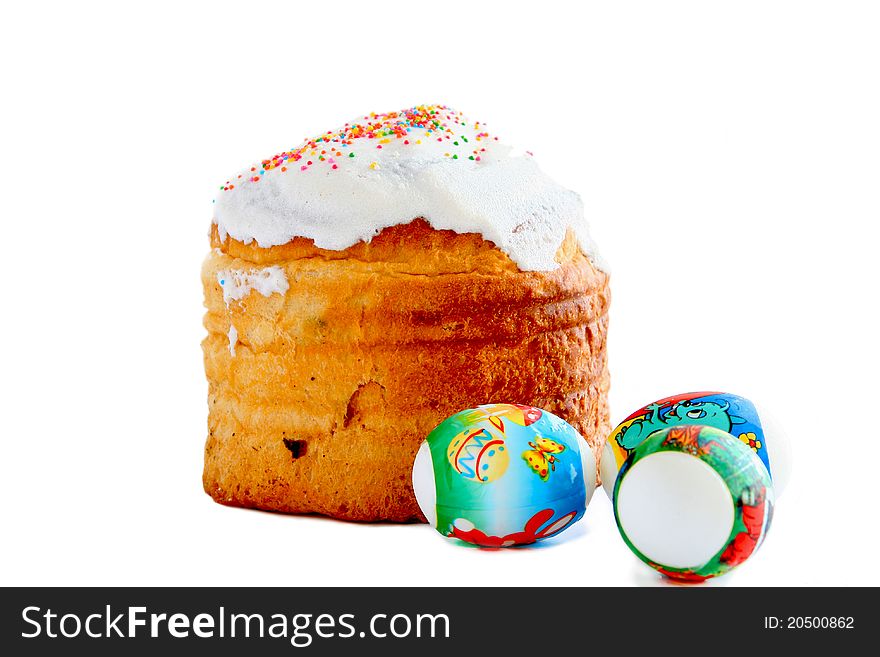 Easter cake and three easter eggs on white background. Easter cake and three easter eggs on white background