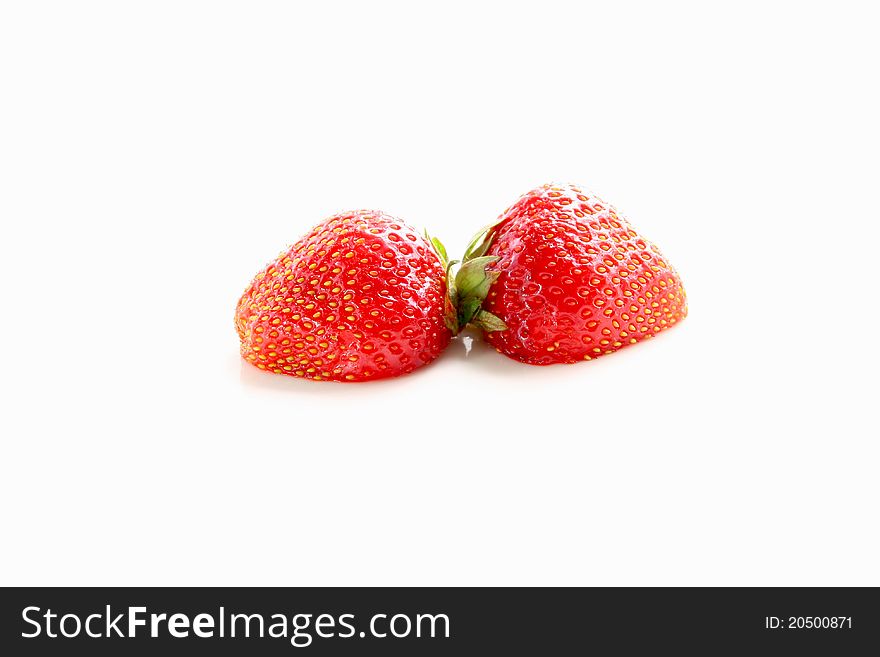Two ripe strawberries on white background. Two ripe strawberries on white background