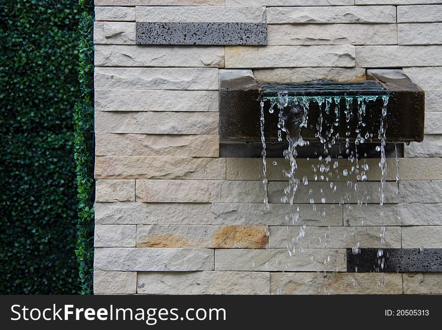 Fountain on wall in the villa