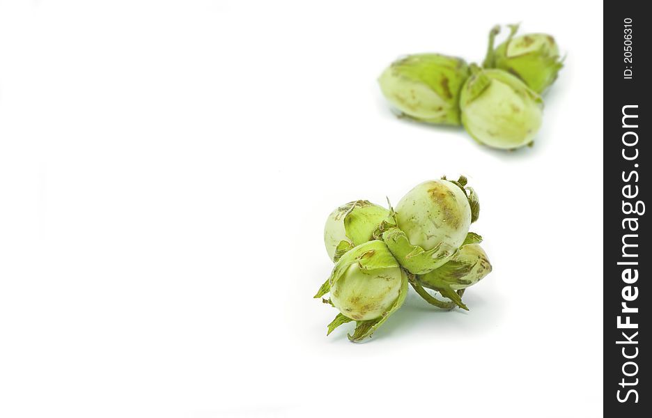 Green peanuts isolated on white