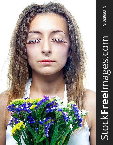 Beautiful woman face with flowers - on white background. Beautiful woman face with flowers - on white background