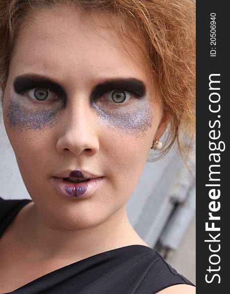 Expressive woman with art make-up