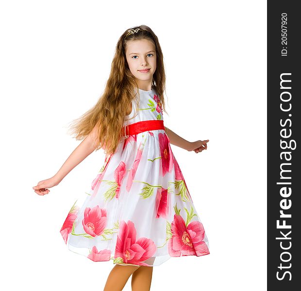 Little girl in red dress on white background