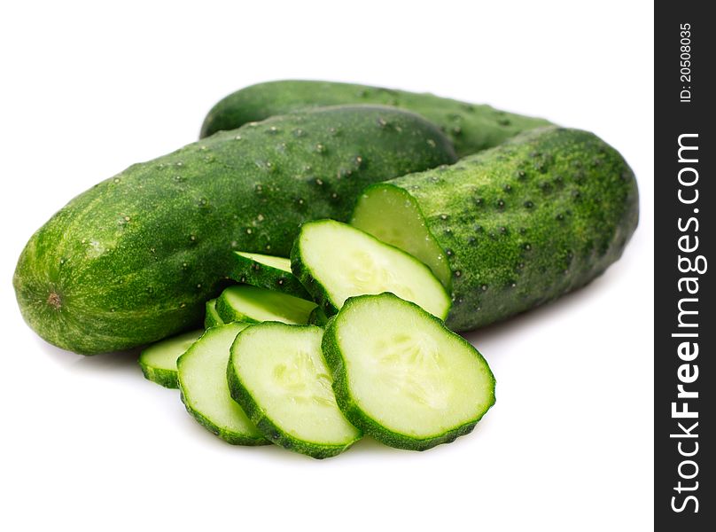 Fresh cucumbers on white