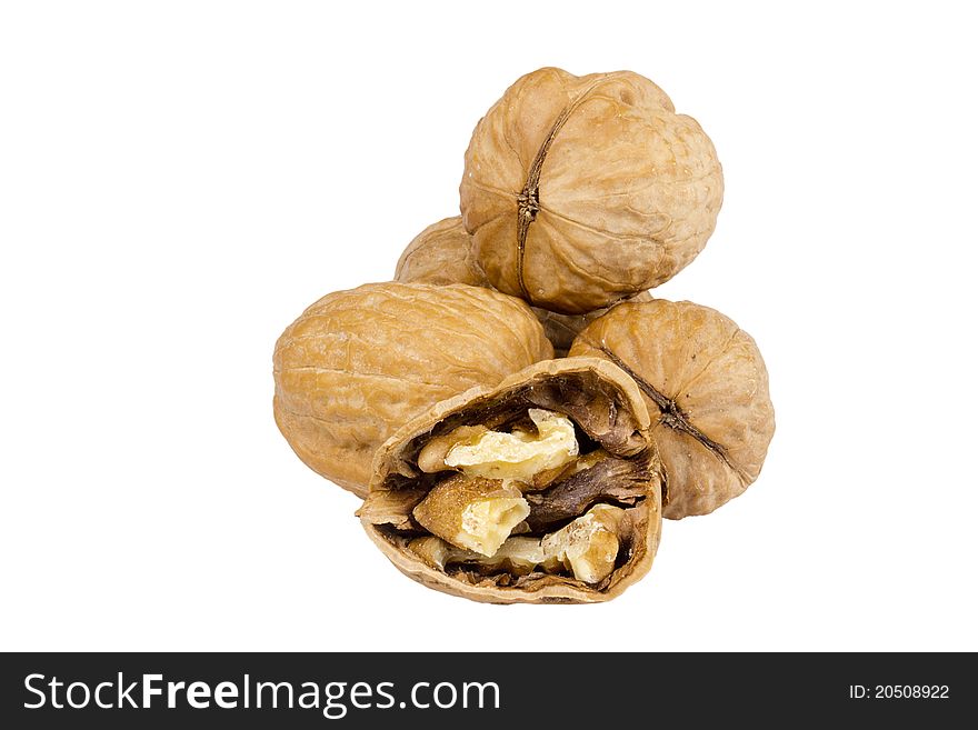 Pile of walnuts isolated on a white background.