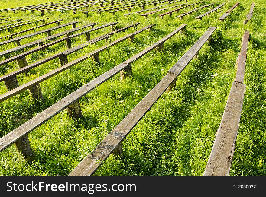 Old wooden bench and grass