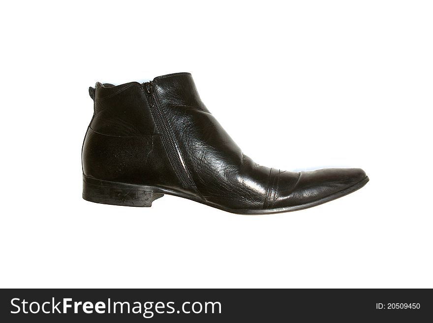 Leather boots isolated against a white background