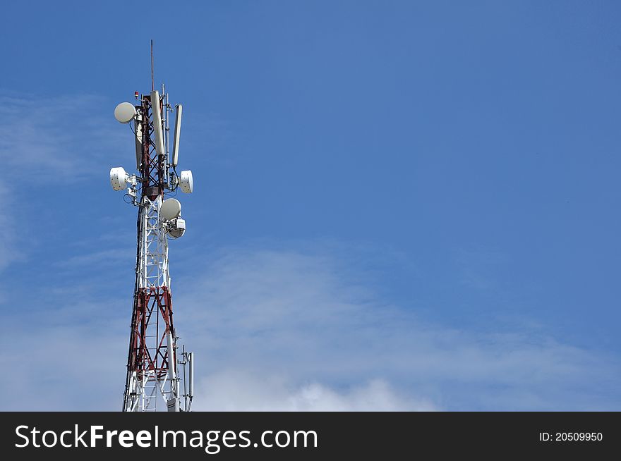 GSM Antenna pylon transmitter and blue sky. GSM Antenna pylon transmitter and blue sky