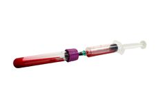 Filling Blood Container From Syringe Stock Photography Filling Blood Container From Syringe Stock Photography