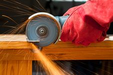 Cutting Steel With A Small Grinder Royalty Free Stock Photography Cutting Steel With A Small Grinder Royalty Free Stock Photography
