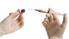 Hands Holding Syringe And Blood Container Royalty Free Stock Photo Hands Holding Syringe And Blood Container Royalty Free Stock Photo