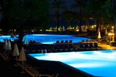 Hotel And Resort Swimming Pool At Night Stock Photography Hotel And Resort Swimming Pool At Night Stock Photography