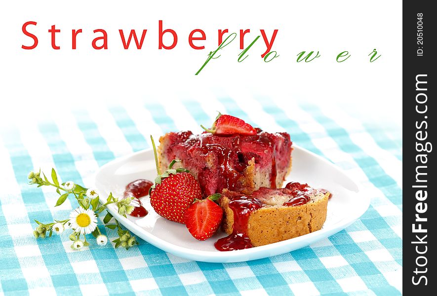 Strawberry cake with jam and fruits on the tablecloth with place for your text