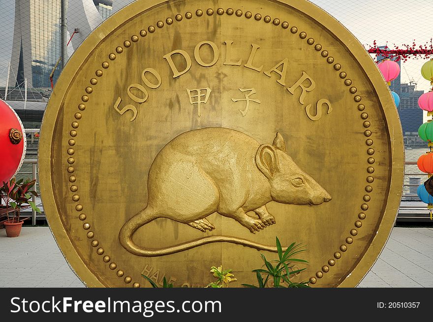 Gold coin of rat on display