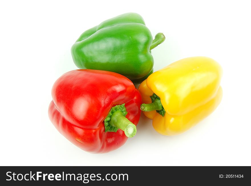Three peppers on white background. Three peppers on white background